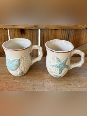Set of 2 Cracker Barrel Time Flies Cream & Blue Mugs Seashells & Starfish 4”H